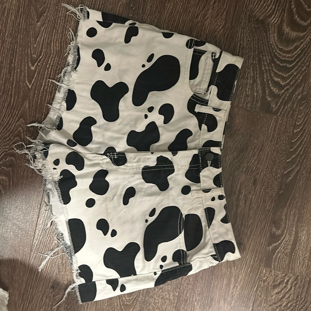 Cow print denim shorts